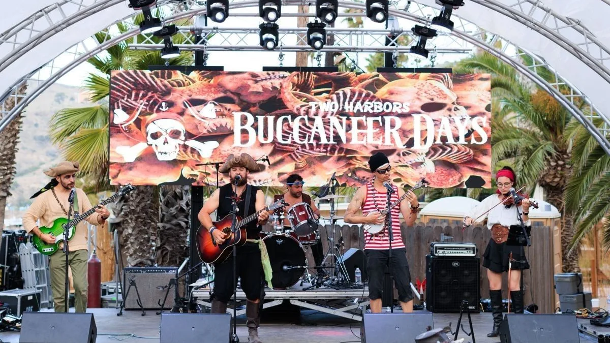 A costumed band performing on the Two Harbors Buccaneer Days stage